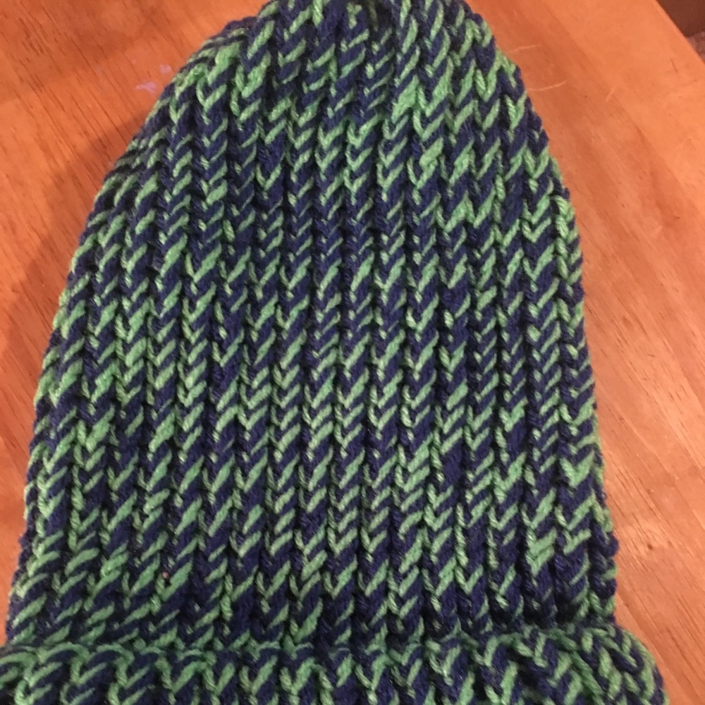 Navy blue and green knit hats